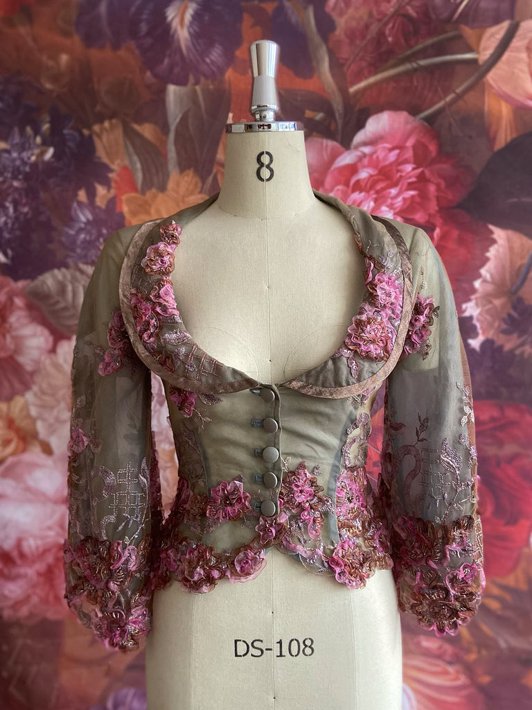Ribbon embroidered and beaded silk and tulle bodice jacket with picture neckline and pagoda sleeves. French grey, rose pink and lavender. Flight of fancy from the Pavilion Parade studio. 