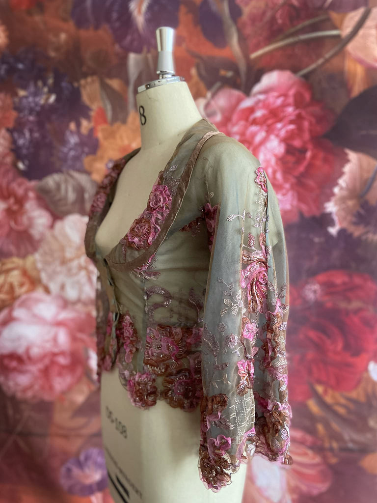 Ribbon embroidered and beaded silk and tulle bodice jacket with picture neckline and pagoda sleeves. French grey, rose pink and lavender. Flight of fancy from the Pavilion Parade studio. 