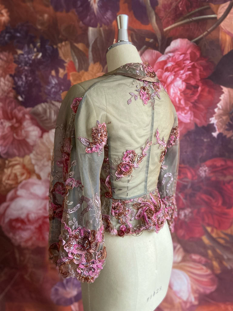 Ribbon embroidered and beaded silk and tulle bodice jacket with picture neckline and pagoda sleeves. French grey, rose pink and lavender. Flight of fancy from the Pavilion Parade studio. 