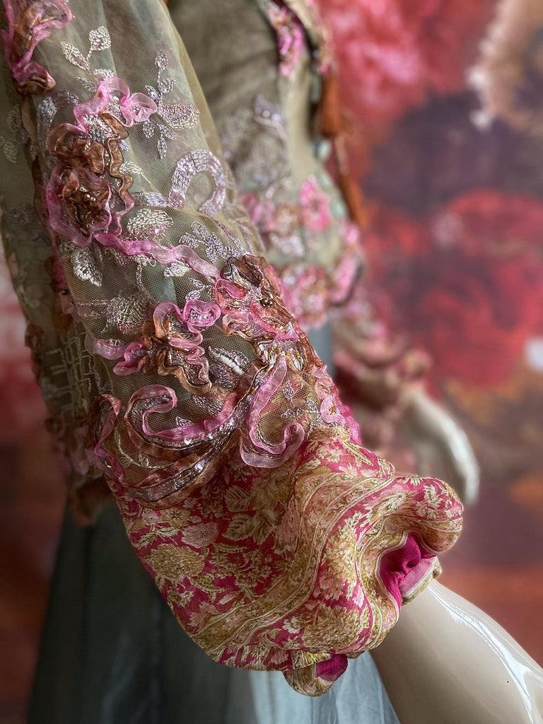 Ribbon embroidered and beaded silk and tulle bodice jacket with picture neckline and pagoda sleeves. French grey, rose pink and lavender. Flight of fancy from the Pavilion Parade studio. 