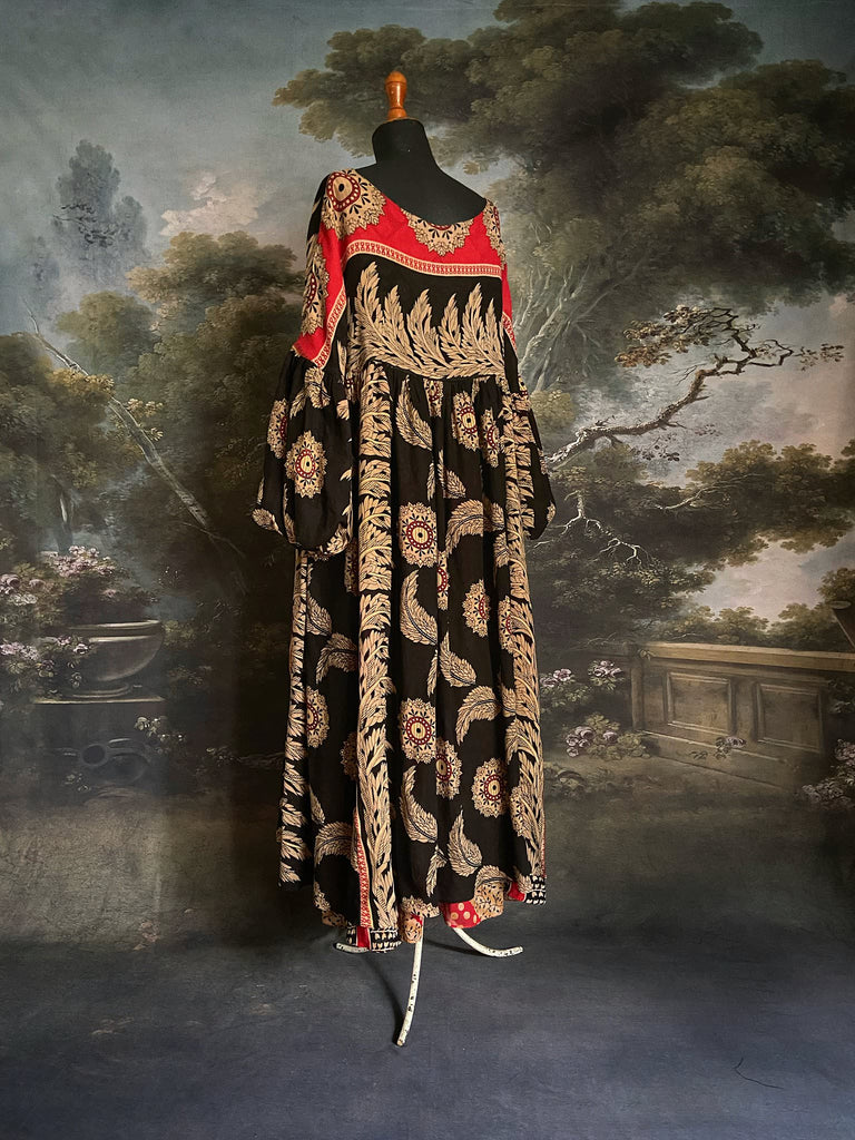 Black and scarlet full sleeve cotton maxi dress with an aesthetic movement inspiration. Bohemian style sustainably created from antique and vintage textiles by the Pavilion Parade studio.