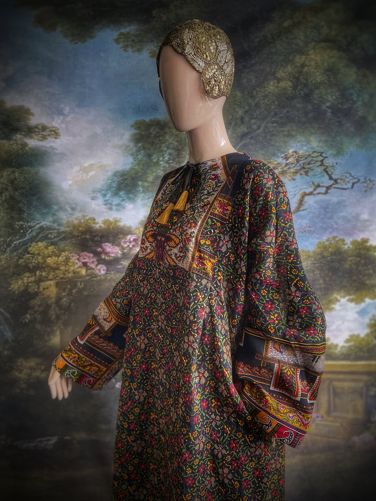 Black block printed floral cotton kaftan maxi dress with pockets and wide sleeves. Unique bohemian styles created from antique and vintage textiles by the Pavilion Parade Studio.