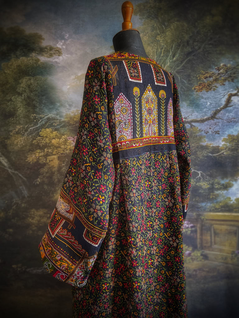 Black block printed floral cotton kaftan maxi dress with pockets and wide sleeves. Unique bohemian styles created from antique and vintage textiles by the Pavilion Parade Studio.