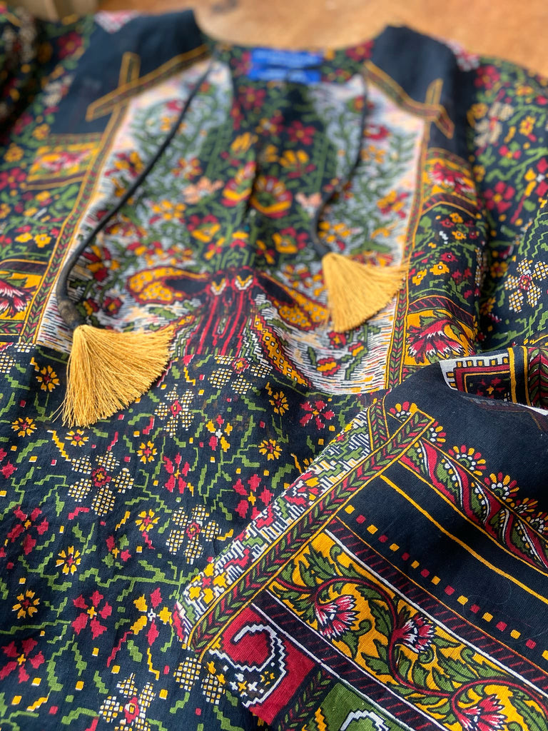 Black block printed floral cotton kaftan maxi dress with pockets and wide sleeves. Unique bohemian styles created from antique and vintage textiles by the Pavilion Parade Studio.