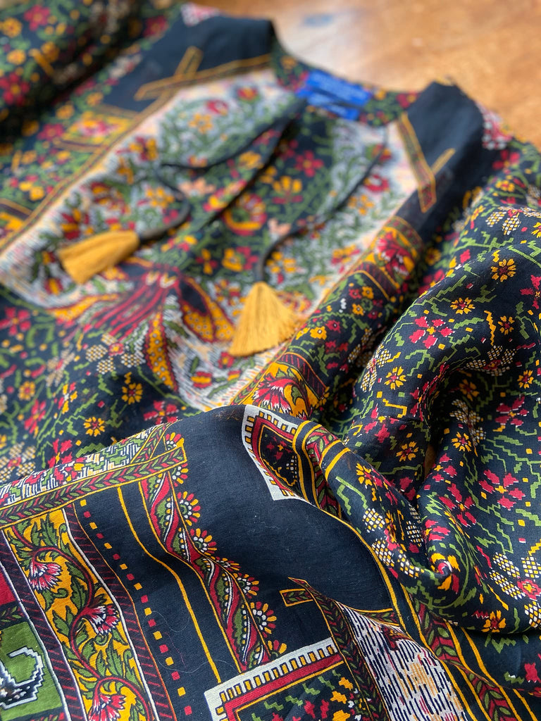 Black block printed floral cotton kaftan maxi dress with pockets and wide sleeves. Unique bohemian styles created from antique and vintage textiles by the Pavilion Parade Studio.