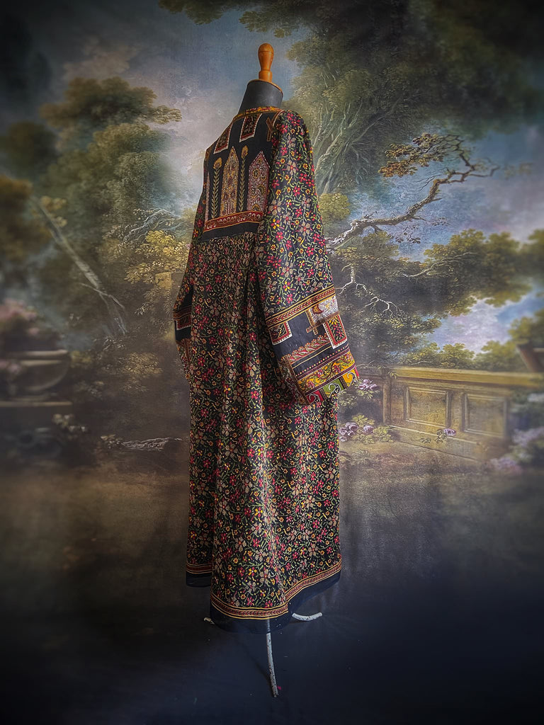 Black block printed floral cotton kaftan maxi dress with pockets and wide sleeves. Unique bohemian styles created from antique and vintage textiles by the Pavilion Parade Studio.