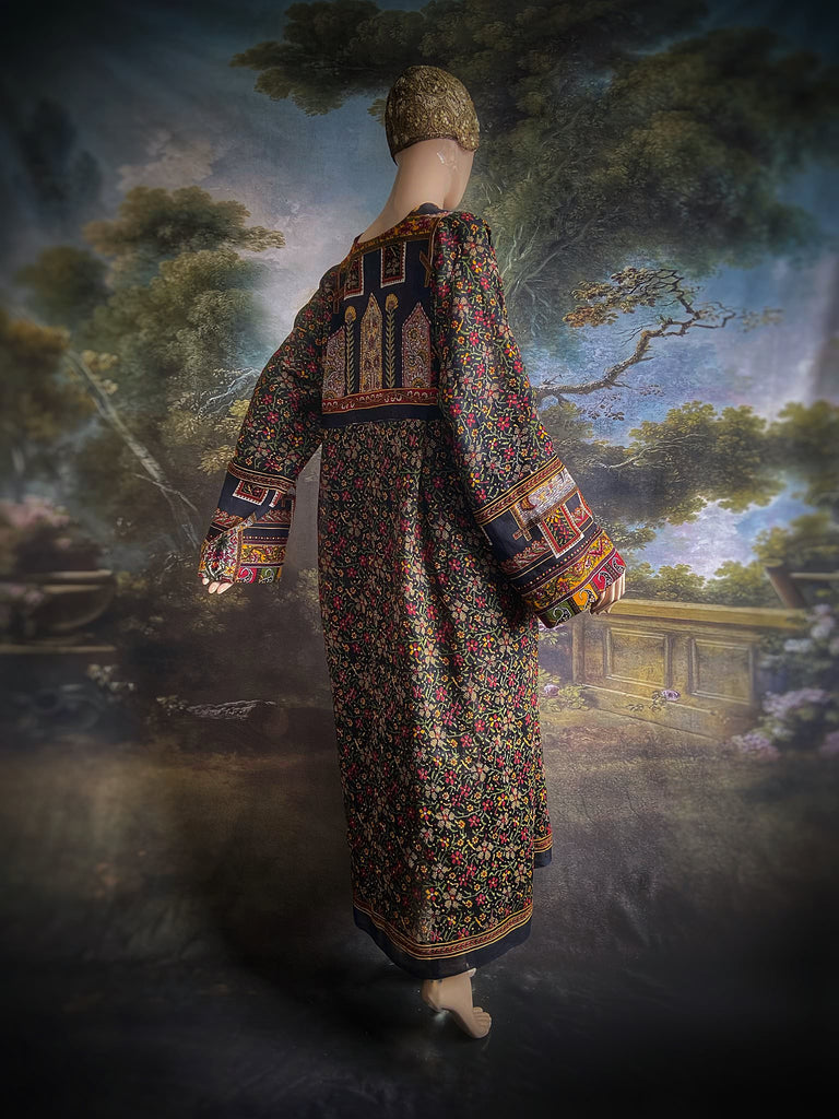 Black block printed floral cotton kaftan maxi dress with pockets and wide sleeves. Unique bohemian styles created from antique and vintage textiles by the Pavilion Parade Studio.