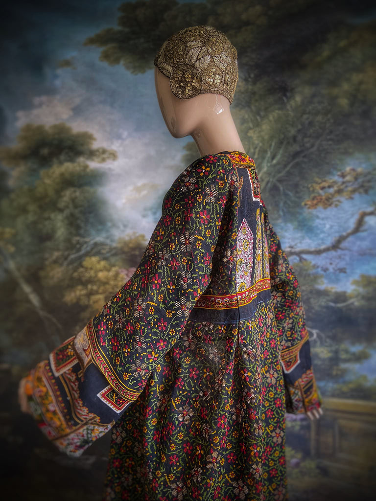 Black block printed floral cotton kaftan maxi dress with pockets and wide sleeves. Unique bohemian styles created from antique and vintage textiles by the Pavilion Parade Studio.