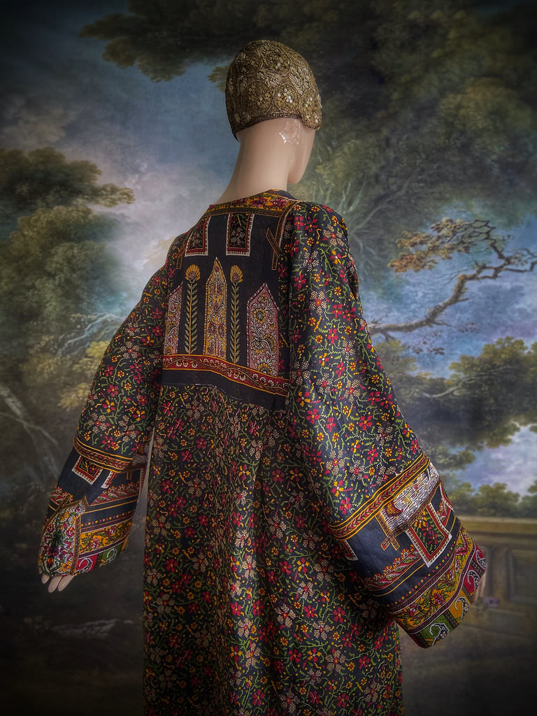 Black block printed floral cotton kaftan maxi dress with pockets and wide sleeves. Unique bohemian styles created from antique and vintage textiles by the Pavilion Parade Studio.