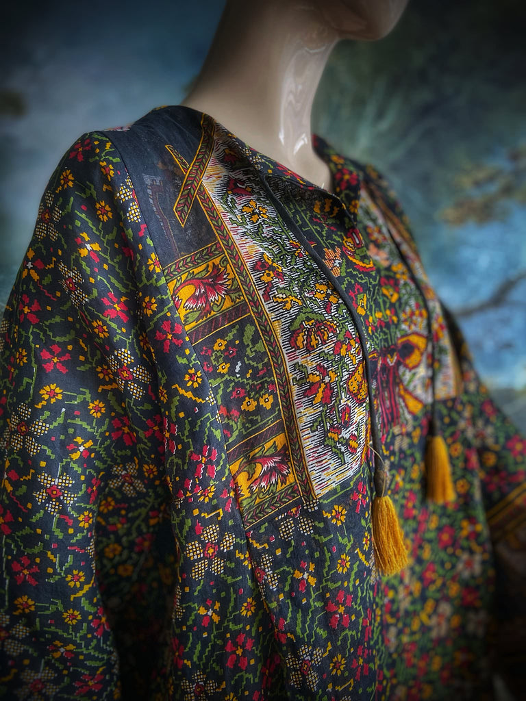 Black block printed floral cotton kaftan maxi dress with pockets and wide sleeves. Unique bohemian styles created from antique and vintage textiles by the Pavilion Parade Studio.