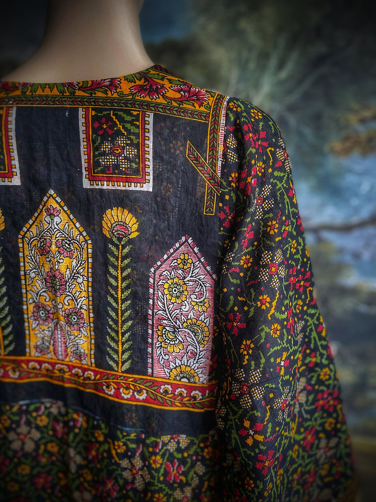 Black block printed floral cotton kaftan maxi dress with pockets and wide sleeves. Unique bohemian styles created from antique and vintage textiles by the Pavilion Parade Studio.