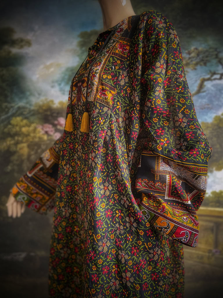 Black block printed floral cotton kaftan maxi dress with pockets and wide sleeves. Unique bohemian styles created from antique and vintage textiles by the Pavilion Parade Studio.