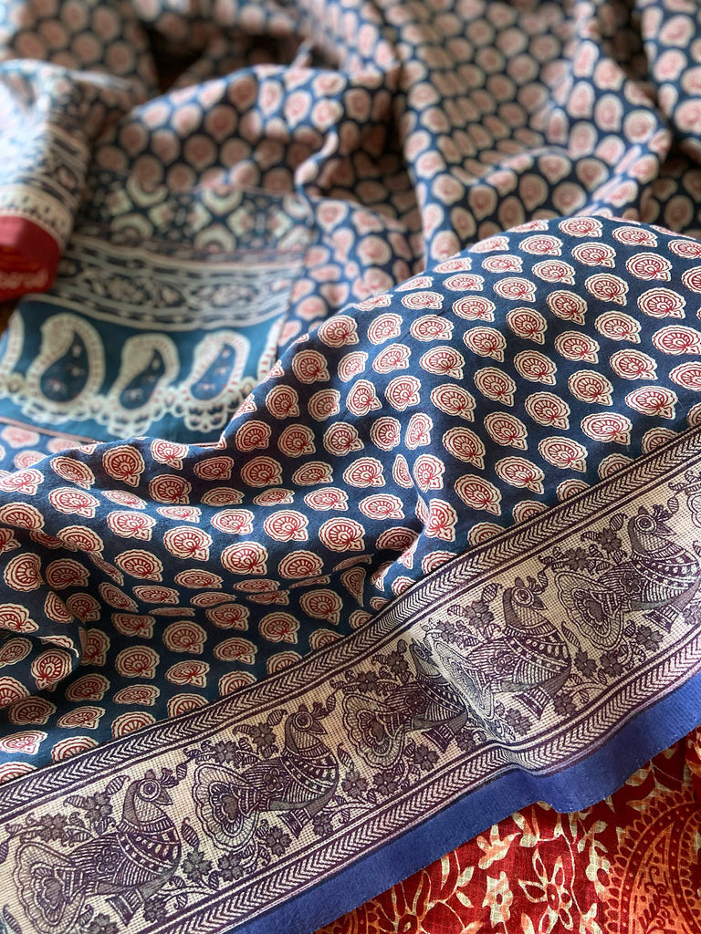 Block printed relaxed fit pure cotton kaftan inspired dress. Reversible design in blood red and indigo. Bohemian style sustainably created from vintage textiles by the Pavilion Parade studio.