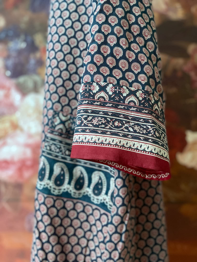 Block printed relaxed fit pure cotton kaftan inspired dress. Reversible design in blood red and indigo. Bohemian style sustainably created from vintage textiles by the Pavilion Parade studio.