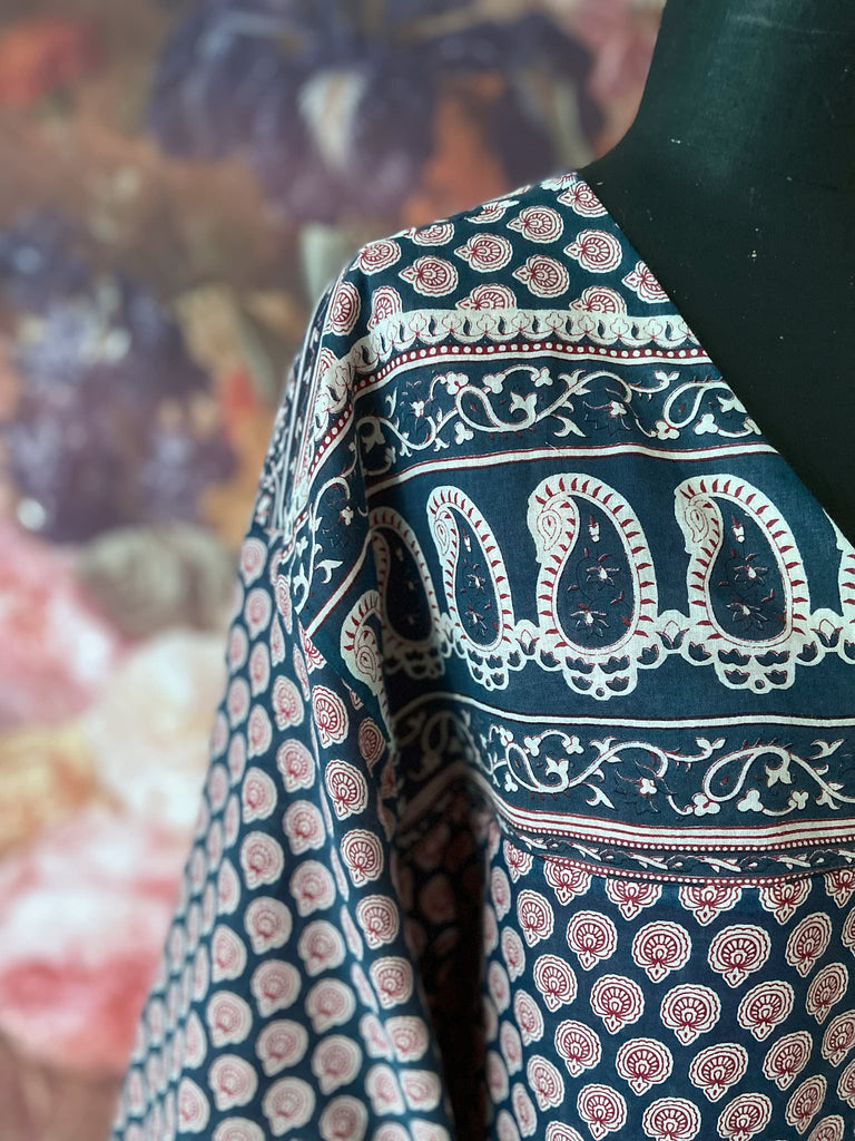 Block printed relaxed fit pure cotton kaftan inspired dress. Reversible design in blood red and indigo. Bohemian style sustainably created from vintage textiles by the Pavilion Parade studio.