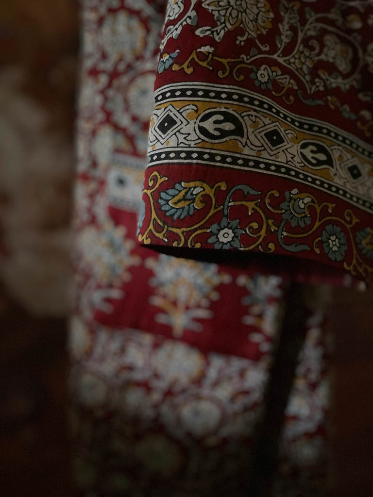 Deep burgundy red and ochre block printed kaftan inspired relaxed fit dress with wide sleeves and pockets. Bohemian style sustainably created from vintage textiles by the Pavilion Parade studio.. 