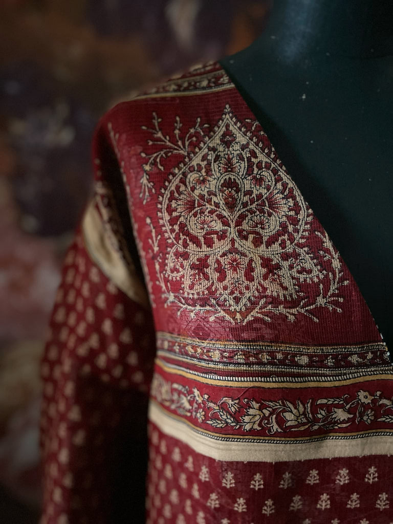 Deep burgundy red and ochre block printed kaftan inspired relaxed fit dress with wide sleeves and pockets. Bohemian style sustainably created from vintage textiles by the Pavilion Parade studio.. 