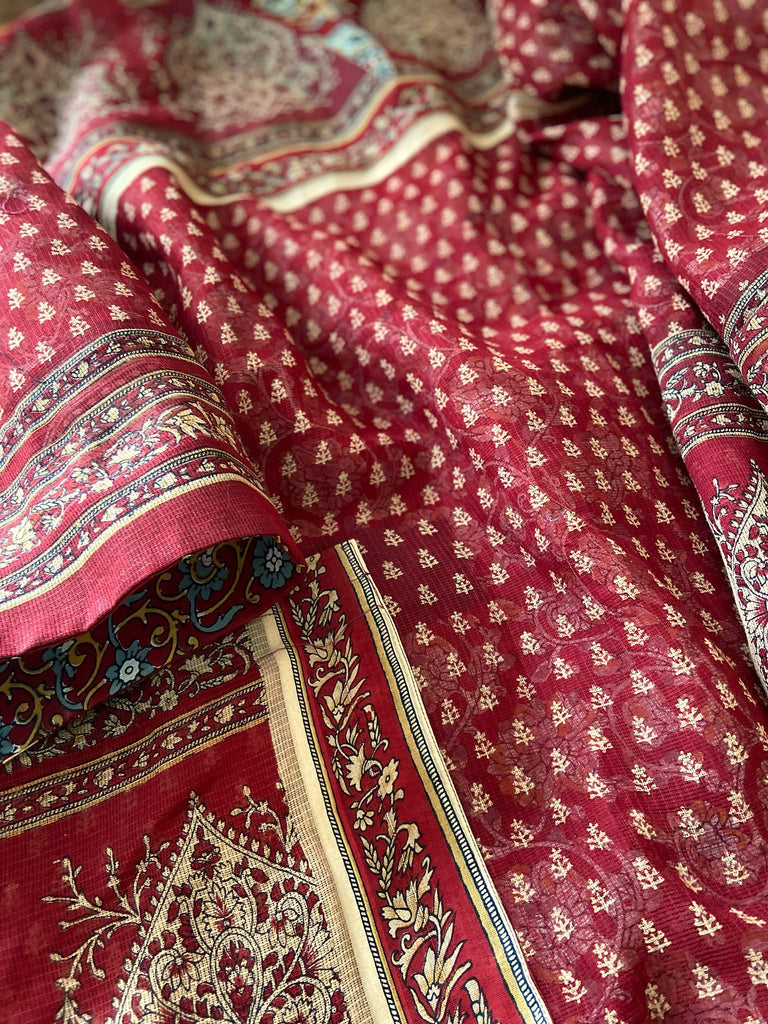 Deep burgundy red and ochre block printed kaftan inspired relaxed fit dress with wide sleeves and pockets. Bohemian style sustainably created from vintage textiles by the Pavilion Parade studio.. 