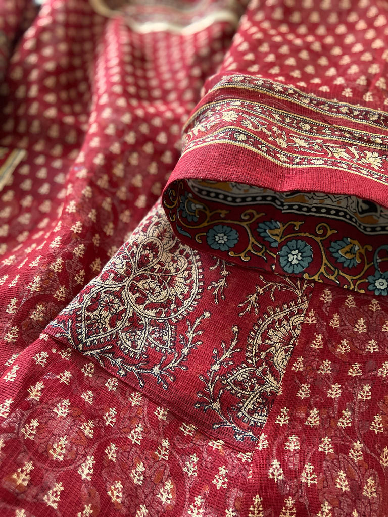 Deep burgundy red and ochre block printed kaftan inspired relaxed fit dress with wide sleeves and pockets. Bohemian style sustainably created from vintage textiles by the Pavilion Parade studio.. 