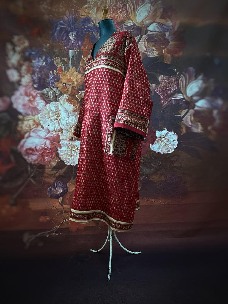 Deep burgundy red and ochre block printed kaftan inspired relaxed fit dress with wide sleeves and pockets. Bohemian style sustainably created from vintage textiles by the Pavilion Parade studio.. 
