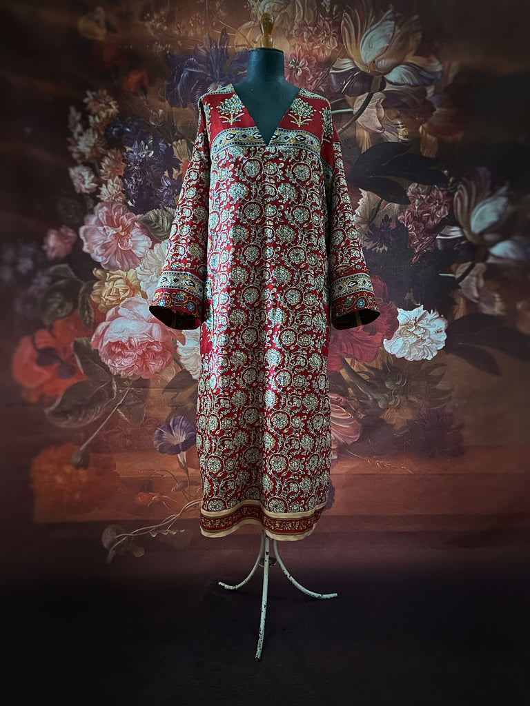 Deep burgundy red and ochre block printed kaftan inspired relaxed fit dress with wide sleeves and pockets. Bohemian style sustainably created from vintage textiles by the Pavilion Parade studio.. 