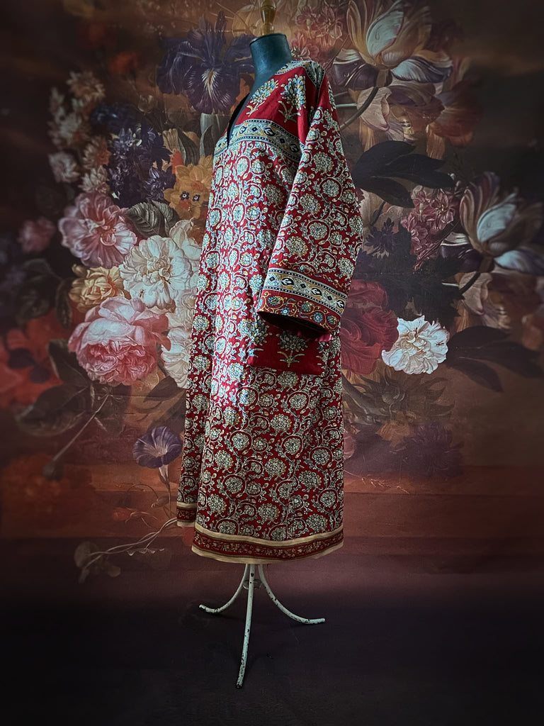 Deep burgundy red and ochre block printed kaftan inspired relaxed fit dress with wide sleeves and pockets. Bohemian style sustainably created from vintage textiles by the Pavilion Parade studio.. 