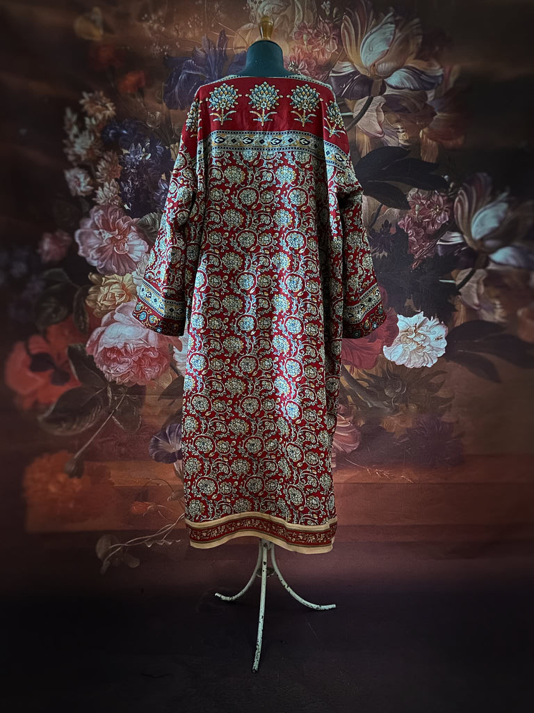 Deep burgundy red and ochre block printed kaftan inspired relaxed fit dress with wide sleeves and pockets. Bohemian style sustainably created from vintage textiles by the Pavilion Parade studio.. 