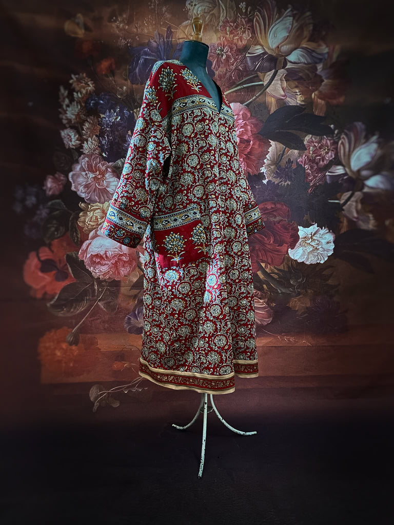 Deep burgundy red and ochre block printed kaftan inspired relaxed fit dress with wide sleeves and pockets. Bohemian style sustainably created from vintage textiles by the Pavilion Parade studio.. 