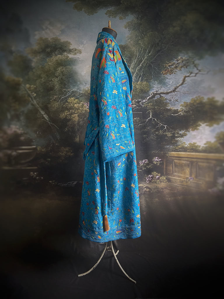 Hand embroidered kantha Royal blue pure silk robe with wide sleeves, tassel sash and patch pockets. Bohemian style created from vintage and antique textiles by Pavilion Parade