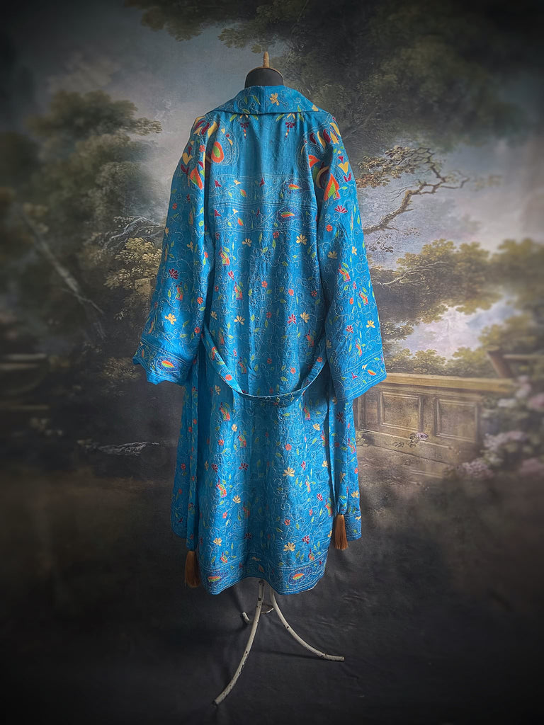 Hand embroidered kantha Royal blue pure silk robe with wide sleeves, tassel sash and patch pockets. Bohemian style created from vintage and antique textiles by Pavilion Parade