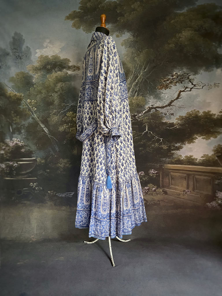 Wedgewood blue and white block printed long dressing robe with bishop sleeves, pockets and tassel sash. Romantic bohemian styles sustainably created from antique and vintage textiles by the Pavilion Parade studio.