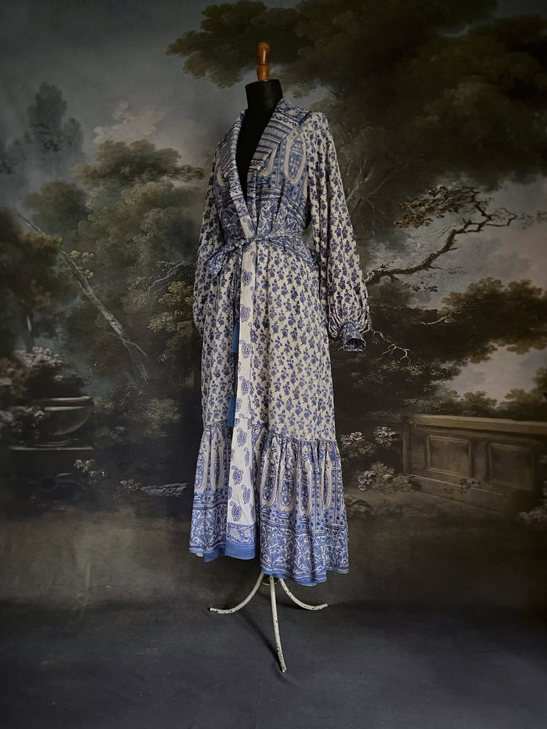 Wedgewood blue and white block printed long dressing robe with bishop sleeves, pockets and tassel sash. Romantic bohemian styles sustainably created from antique and vintage textiles by the Pavilion Parade studio.