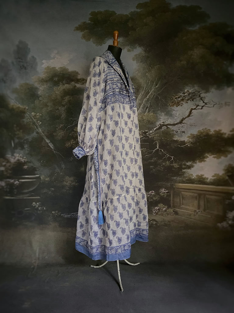 Wedgewood blue and white block printed long dressing robe with bishop sleeves, pockets and tassel sash. Romantic bohemian styles sustainably created from antique and vintage textiles by the Pavilion Parade studio.