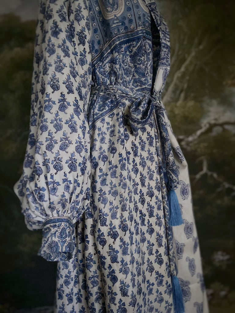 Wedgewood blue and white block printed long dressing robe with bishop sleeves, pockets and tassel sash. Romantic bohemian styles sustainably created from antique and vintage textiles by the Pavilion Parade studio.