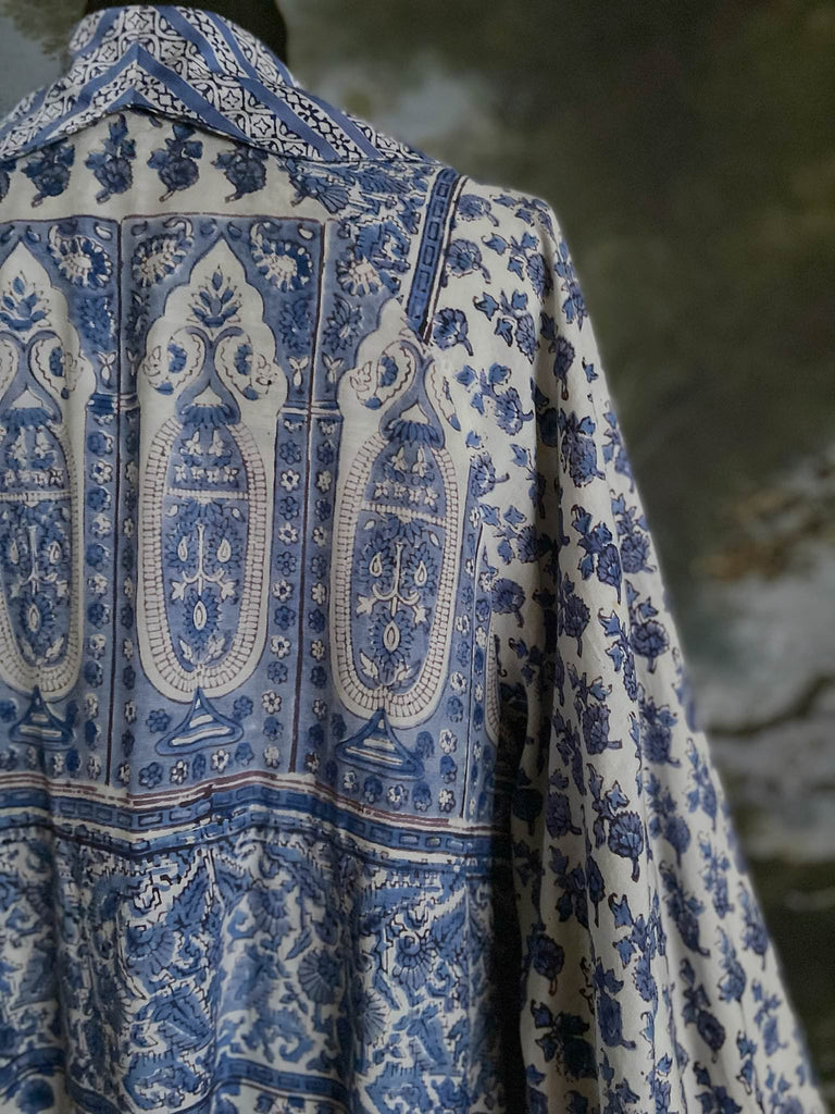 Wedgewood blue and white block printed long dressing robe with bishop sleeves, pockets and tassel sash. Romantic bohemian styles sustainably created from antique and vintage textiles by the Pavilion Parade studio.