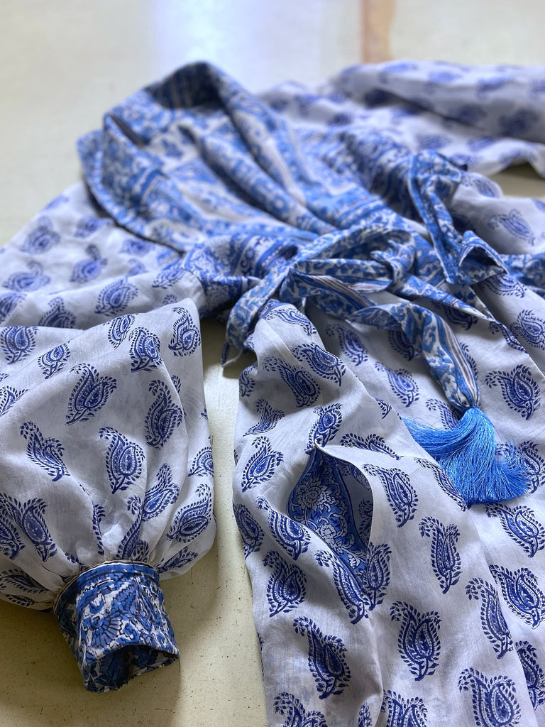 Wedgewood blue and white block printed long dressing robe with bishop sleeves, pockets and tassel sash. Romantic bohemian styles sustainably created from antique and vintage textiles by the Pavilion Parade studio.