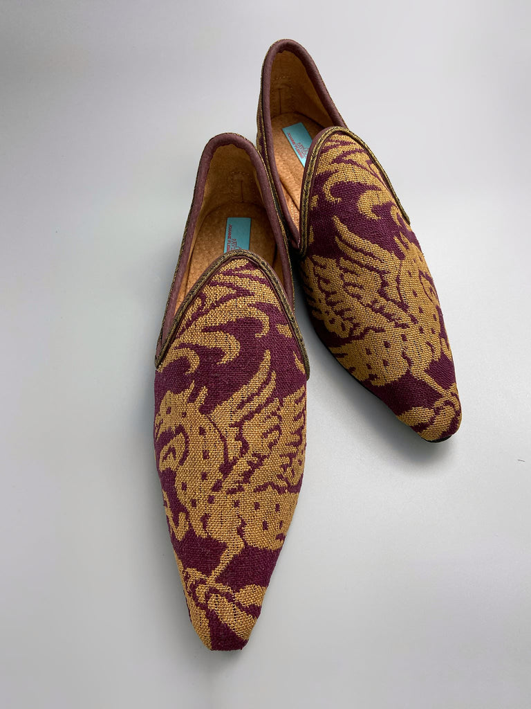 Burgundy red and old gold linen silk brocade pointed toe slipper shoes. Woven dragon or gryphon motifs. Sustainably created from antique textiles from the Pavilion Parade studio.