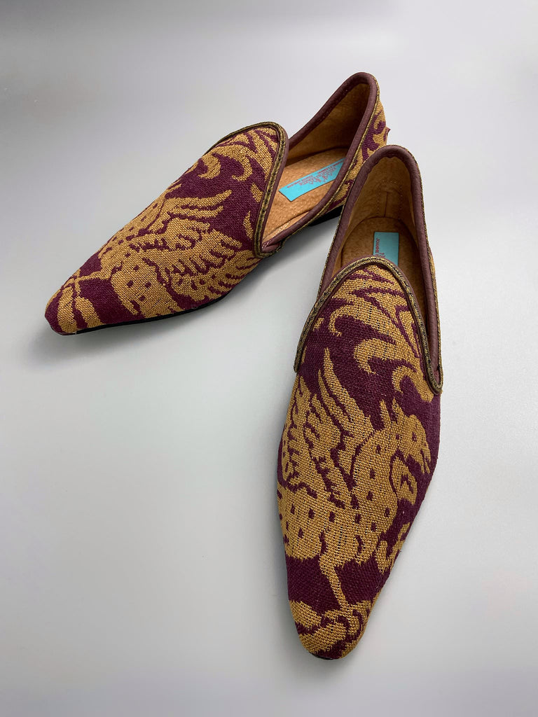 Burgundy red and old gold linen silk brocade pointed toe slipper shoes. Woven dragon or gryphon motifs. Sustainably created from antique textiles from the Pavilion Parade studio.