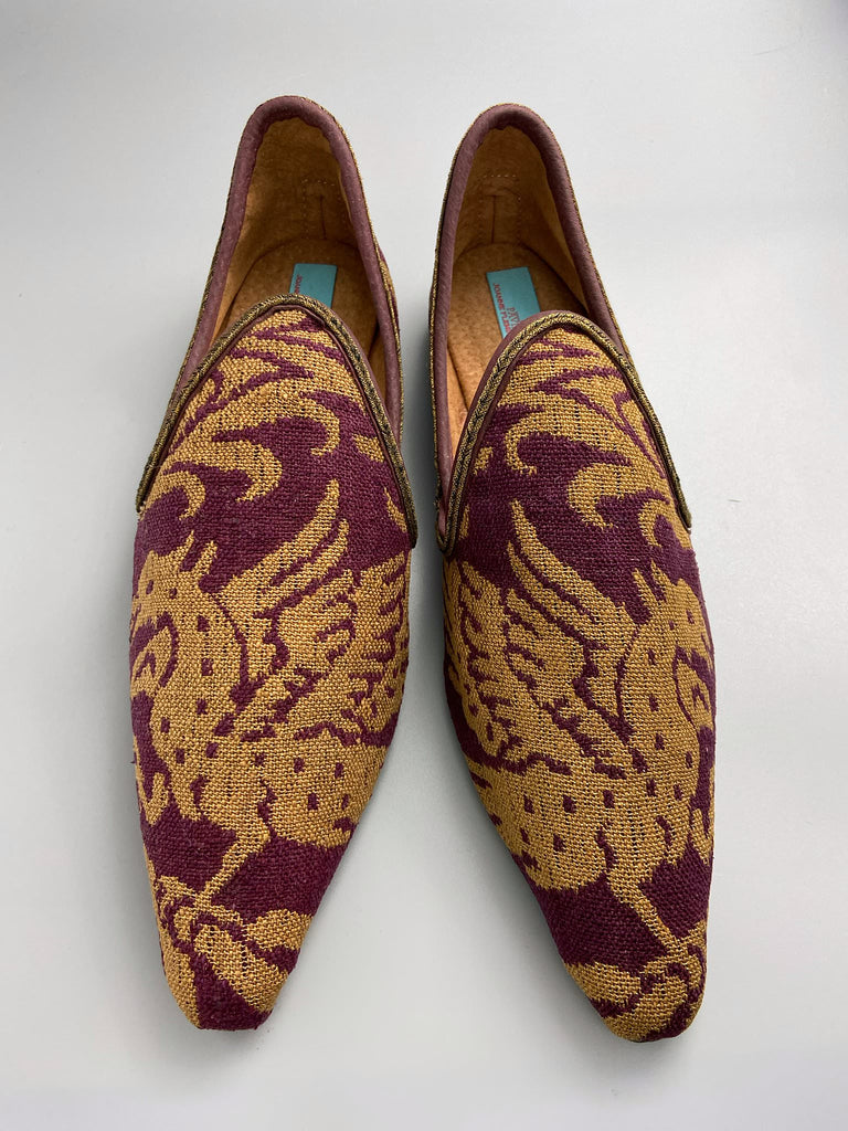 Burgundy red and old gold linen silk brocade pointed toe slipper shoes. Woven dragon or gryphon motifs. Sustainably created from antique textiles from the Pavilion Parade studio.