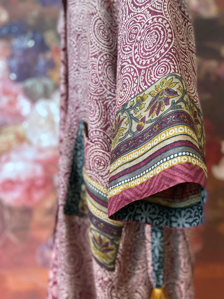 Dark burgundy red, ochre and ivory fine wool luxury dressing robe. Lined in silk and sustainably created from antique and vintage textiles by the Pavilion Parade studio.