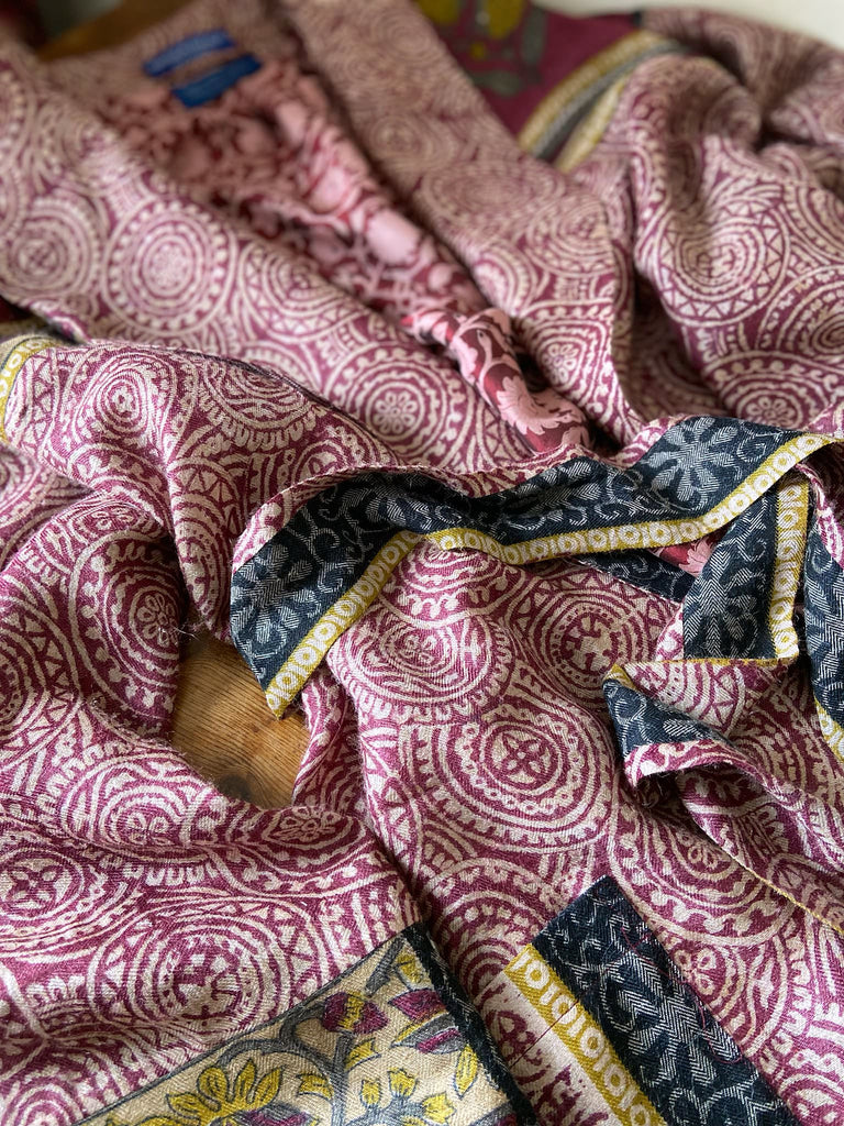 Dark burgundy red, ochre and ivory fine wool luxury dressing robe. Lined in silk and sustainably created from antique and vintage textiles by the Pavilion Parade studio.