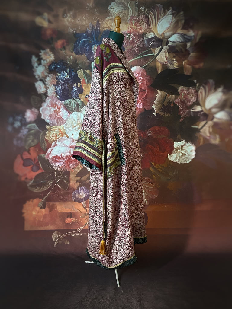 Dark burgundy red, ochre and ivory fine wool luxury dressing robe. Lined in silk and sustainably created from antique and vintage textiles by the Pavilion Parade studio.