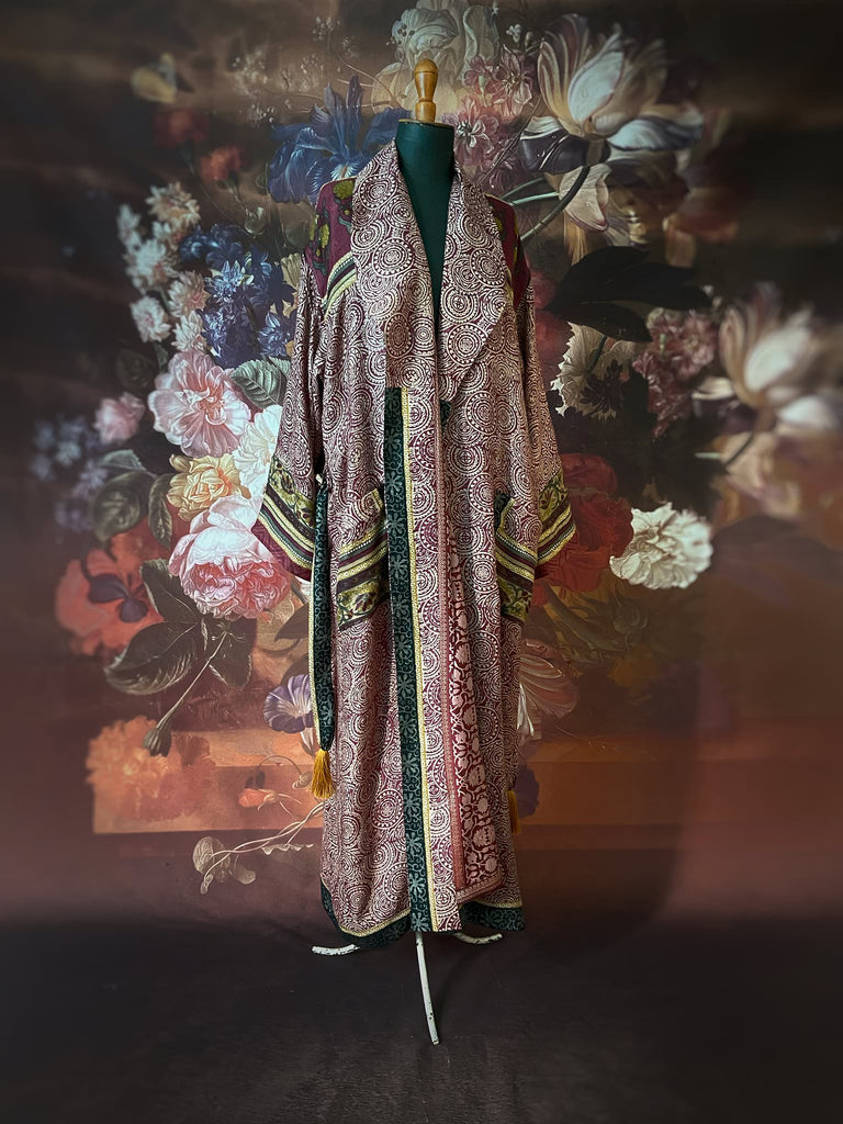 Dark burgundy red, ochre and ivory fine wool luxury dressing robe. Lined in silk and sustainably created from antique and vintage textiles by the Pavilion Parade studio.