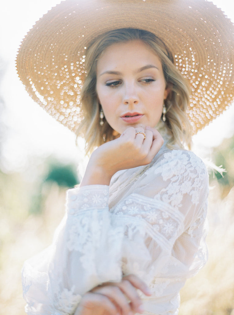 Ivory French lace and silk organza fitted romantic blouse. Antique lace elements at high fitted collar and cuffs. Full bishop sleeves and pleated bodice front. A flight of fancy from the Pavilion Parade studio. Photo by Mariel Hannah.