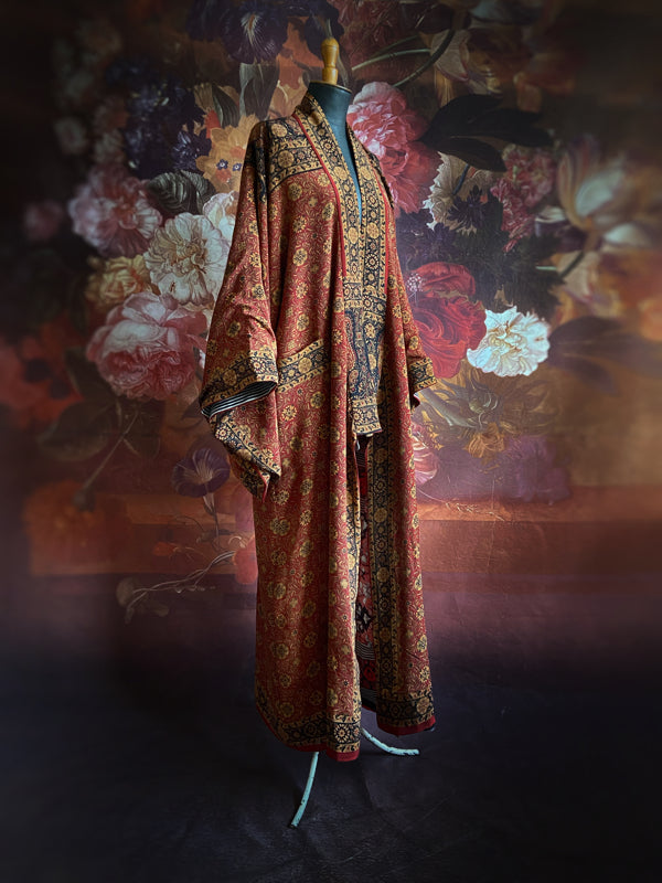 1920s inspired silk kimono robe created from vintage black, mustard, and dark sienna red silk crepe. Unique bohemian designs from the Pavilion Parade studio.