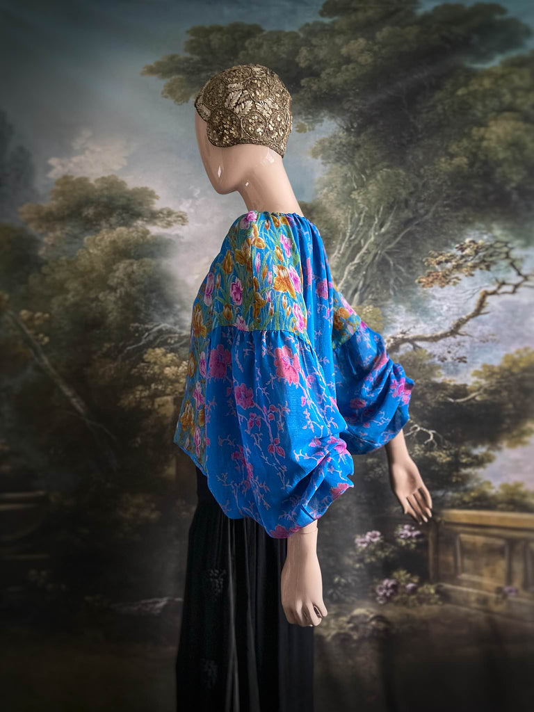 Cerulean blue and rose pink silk georgette blouse with long full sleeves and adjustable drawstring neckline. Bohemian styles sustainably created from antique and vintage textiles by the Pavilion Parade studio. 