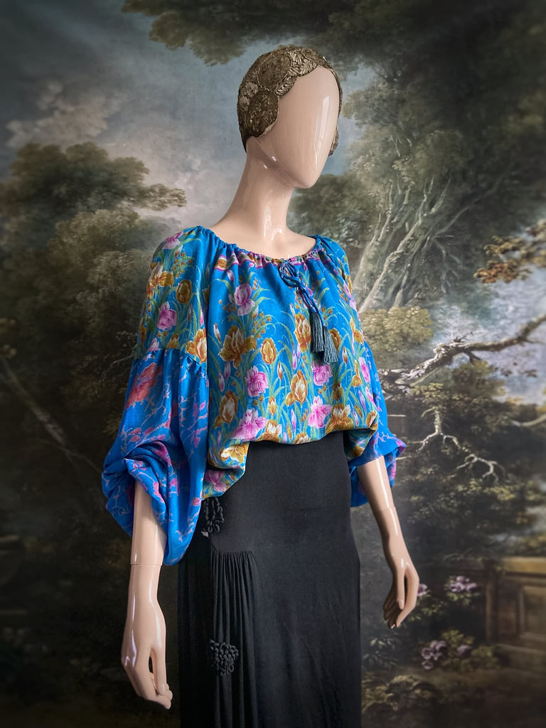 Cerulean blue and rose pink silk georgette blouse with long full sleeves and adjustable drawstring neckline. Bohemian styles sustainably created from antique and vintage textiles by the Pavilion Parade studio. 