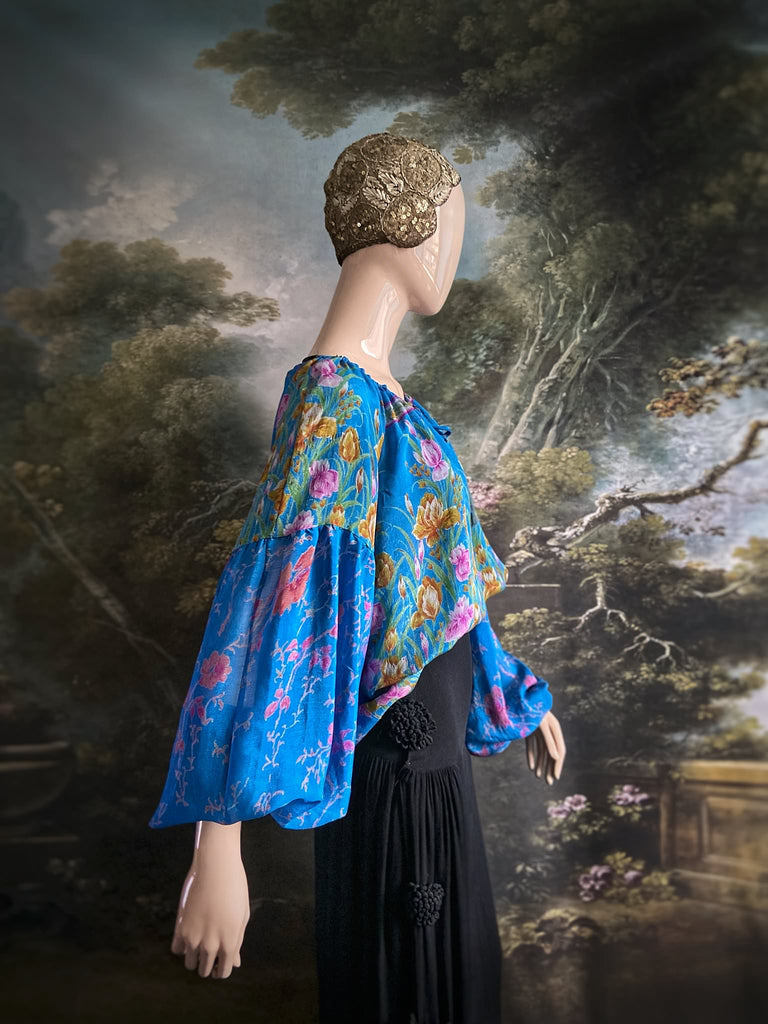 Cerulean blue and rose pink silk georgette blouse with long full sleeves and adjustable drawstring neckline. Bohemian styles sustainably created from antique and vintage textiles by the Pavilion Parade studio. 