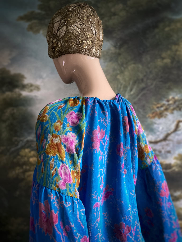 Cerulean blue and rose pink silk georgette blouse with long full sleeves and adjustable drawstring neckline. Bohemian styles sustainably created from antique and vintage textiles by the Pavilion Parade studio. 