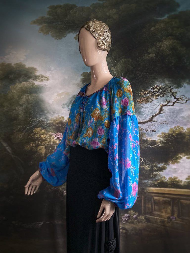 Cerulean blue and rose pink silk georgette blouse with long full sleeves and adjustable drawstring neckline. Bohemian styles sustainably created from antique and vintage textiles by the Pavilion Parade studio. 